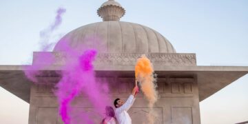 A couple celebrating Holi